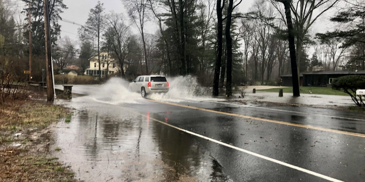 Long steady rains flood local roadways