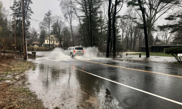 Long steady rains flood local roadways