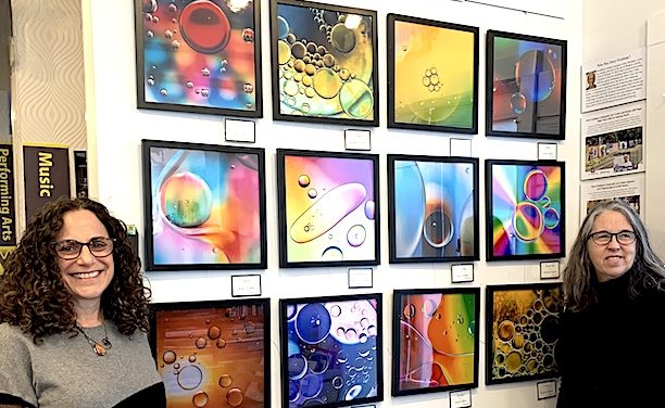 Photos of abstract imagery displayed at Westport Book Shop