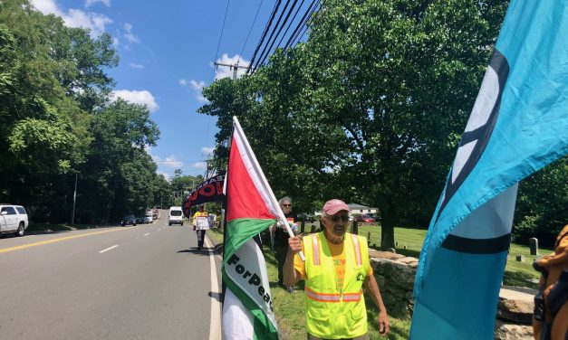 Group opposed to war walks through Westport