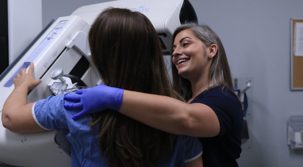 The Nuvance Health Smilow Breast Center at iPark, part of Norwalk Hospital offers all breast imaging, including mammography, ultrasound and MRI. Mersades Nigl, mammography technologist, positions a woman for a screening mammogram - Photo John P. Moreno, Videographer / Photographer, Nuvance Health