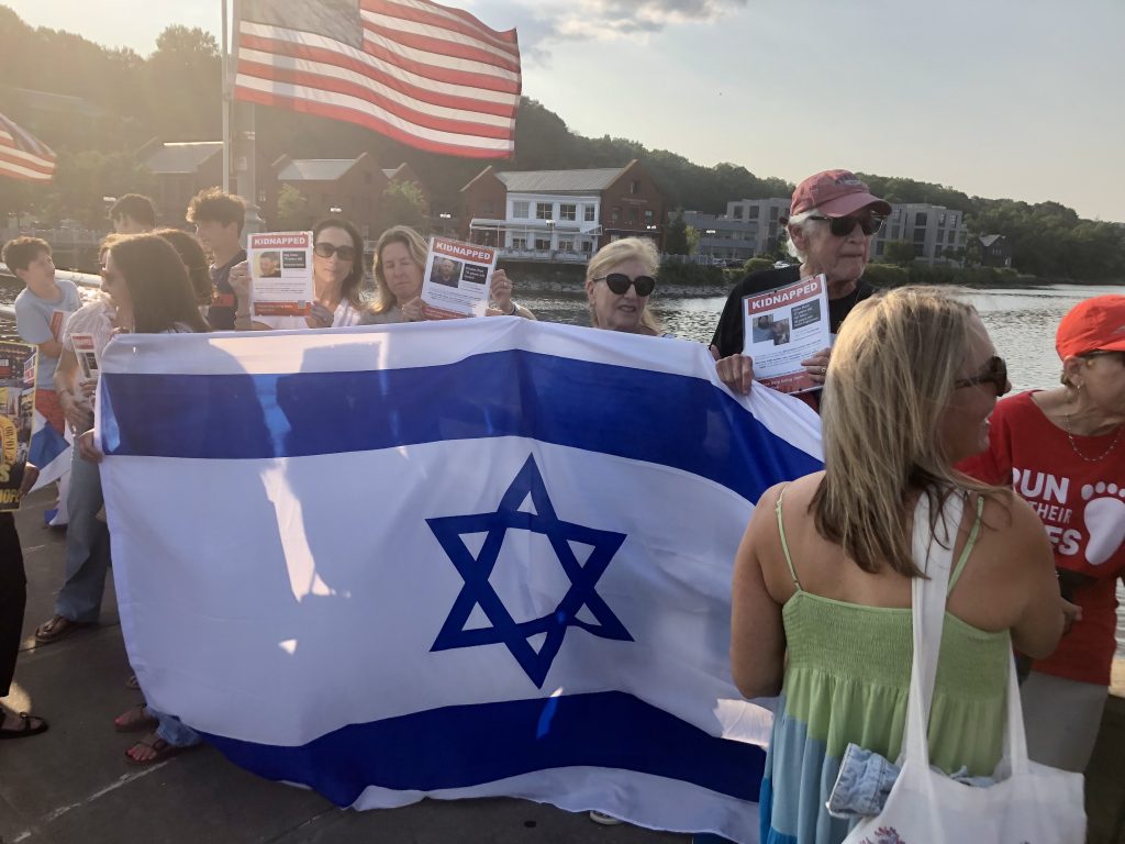 Some 150 people gathered on the Ruth Steinhaus Cohen Bridge on Thursday evening to remind people that hundreds of Israeli hostages are still be held in Gaza. / Photos by Thane Grauel