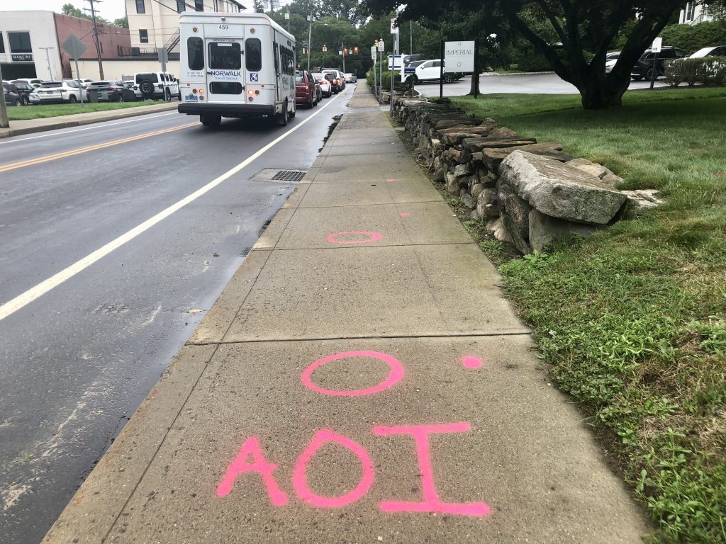 The "Areas of Impact" on the Imperial Avenue sidewalk where two people were struck by an SUV on Tuesday evening. / Photos by Thane Grauel