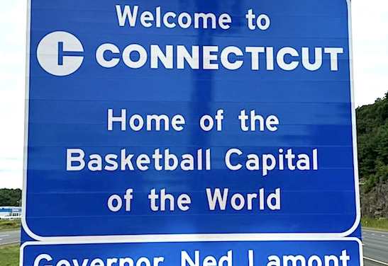 Highway snobbery? State’s new ‘welcome’ signs boast of hoops, pizza and subs