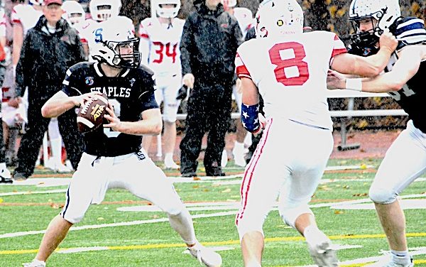 Staples football carves up Greenwich in soggy Thanksgiving showdown