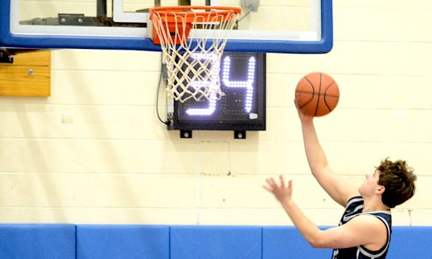 Staples boys basketball doubles down to claim tourney laurels