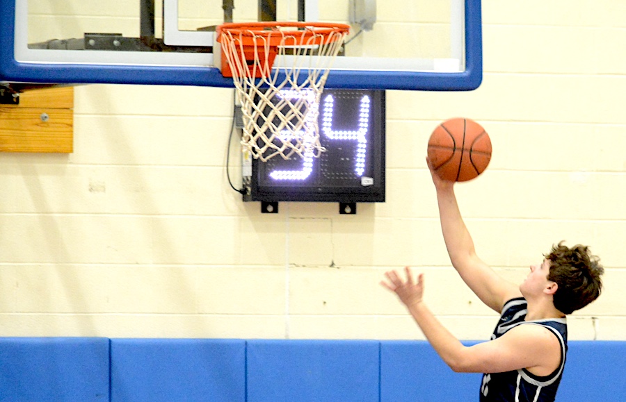 Staples boys basketball doubles down to claim tourney laurels