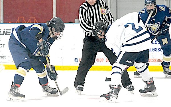 STORMAC boys hockey splits two contests