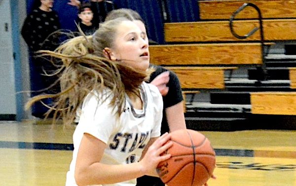 Staples girls basketball tops New Canaan