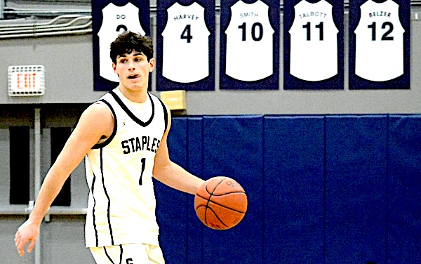 Staples boys basketball nets 16th win of season