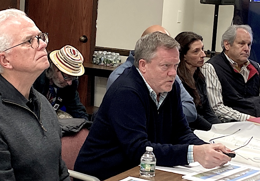 Photo above: Jay Keenan, center, chair of the Long Lots School Building Committee makes a point at Thursday pre-application with the Planning and Zoning Commission. Below: P&Z Chair Paul Lebowitz, left, and member Neil Cohn listening to Keenan.