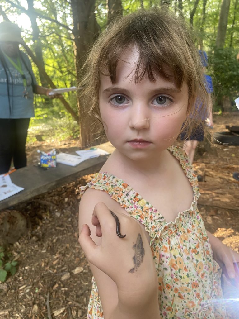 Audrey Killian shows a worm she has befriended