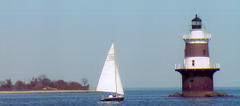 Sailing past Peck Ledge Light, with Cockenoe Island in the background - Photo Barry Natale