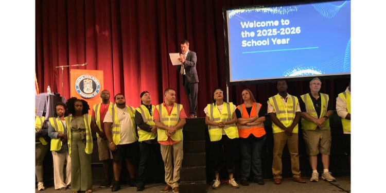 Westport school bus drivers are called up to the front of the auditorium to be applauded - Photo Linda Lambeck