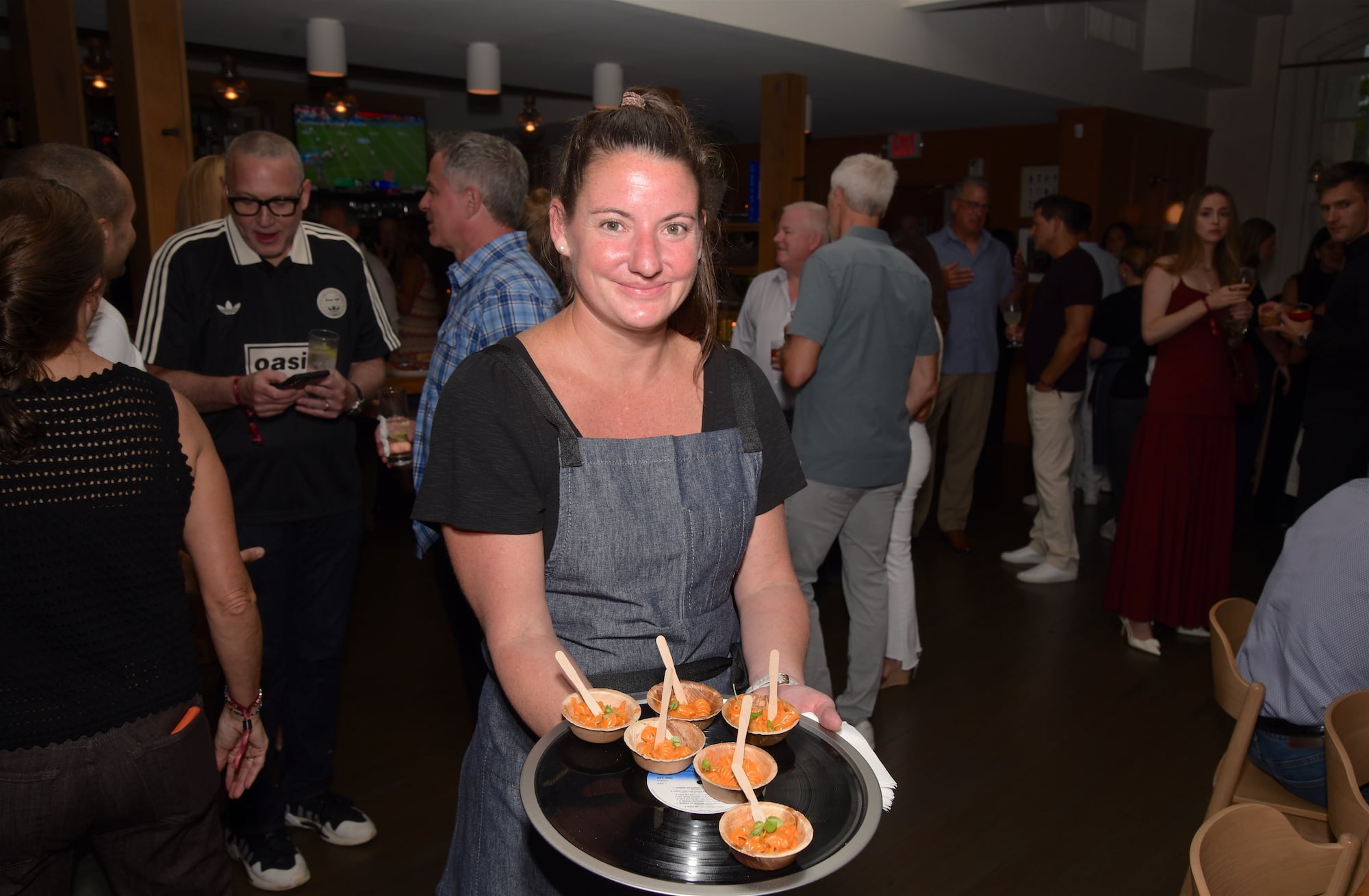 Massi Co server Molly Kreter with radiatore with spicy vodka