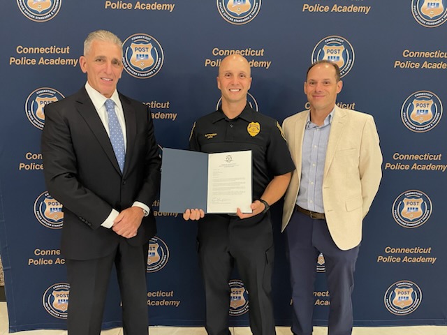 (L-R) Chairman Keith Mello of the Connecticut Police Officer Standards and Training Council; Westport Staff Corporal Michael Ruttenber; and Westport Deputy Chief David Wolf - Contributed photo