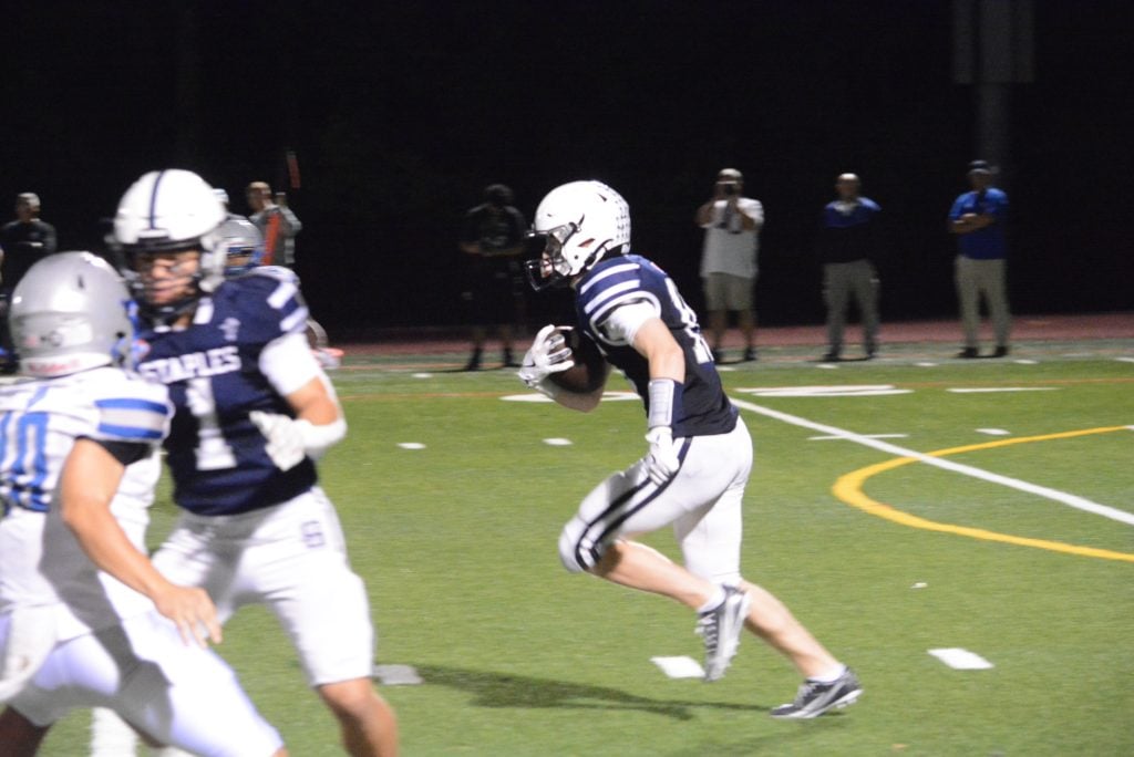 Charlie Clark returns the second-half kickoff 87 yards for a TD.