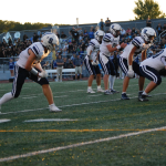 Staples stomps Stamford 49-6
