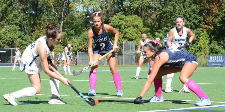 Dasiy Hackett, left, and Oakley Wilson, defend as Wilton looks to move up field along the sideline - Photos Andy Hutchison