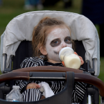 Tots toddling downtown in costume, a Westport tradition