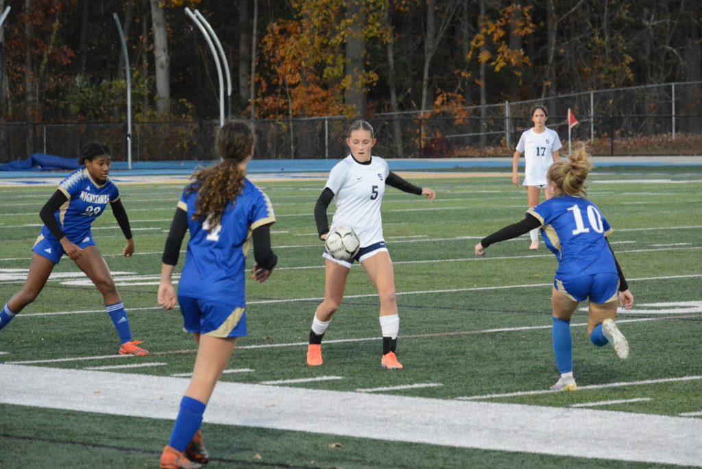 Sienna Schwartz takes on a group of opponents.