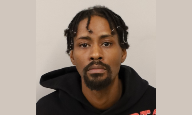 Alleged check forger is checked back in