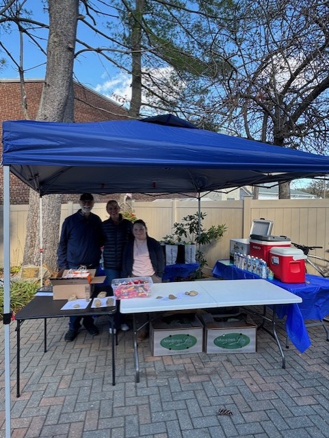 Steve James, Katharine Murray and Sydney Schiller at the Grab and Gofeature of the Gillespie Center's food pantry - Contributed photo