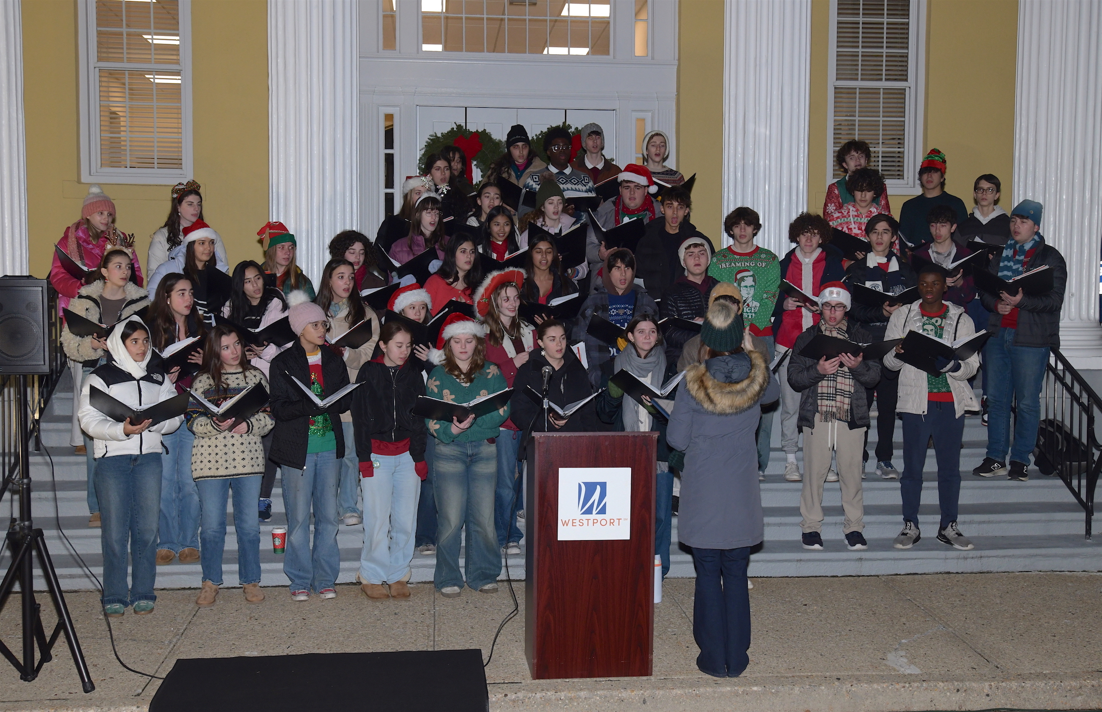 The Orphenians sang four Christmas favorites, under the direction of Lauren Pine, Staples Choir Director