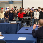 Orphenians serenade the Board of Education