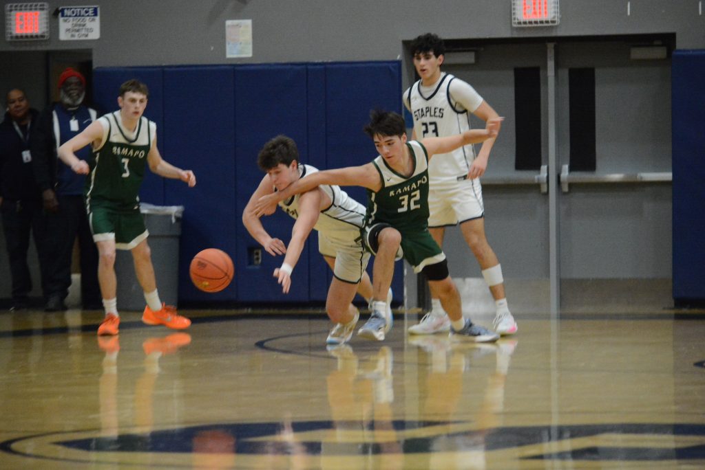 Mason Tobias and Dhilan Lowman (No. 23) on defense - Photo Andy Hutchison