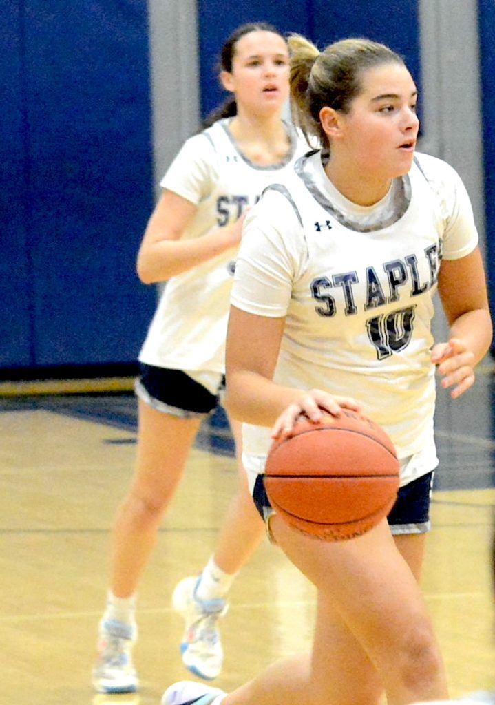 Chloe Smith in action in February of 2025. Smith poured in 23 points to lead the Staples offense in the opener Photo Andy Hutchison