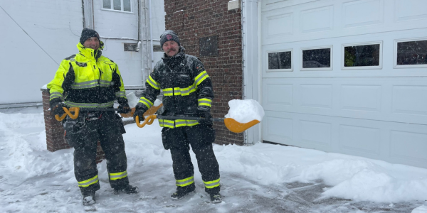 Firemen Robert Fargo and Drew Haig cleaning up the snow in front of the Saugatuck firehouse, Jan. 25, 2026 - Photo Pamela Einarsen