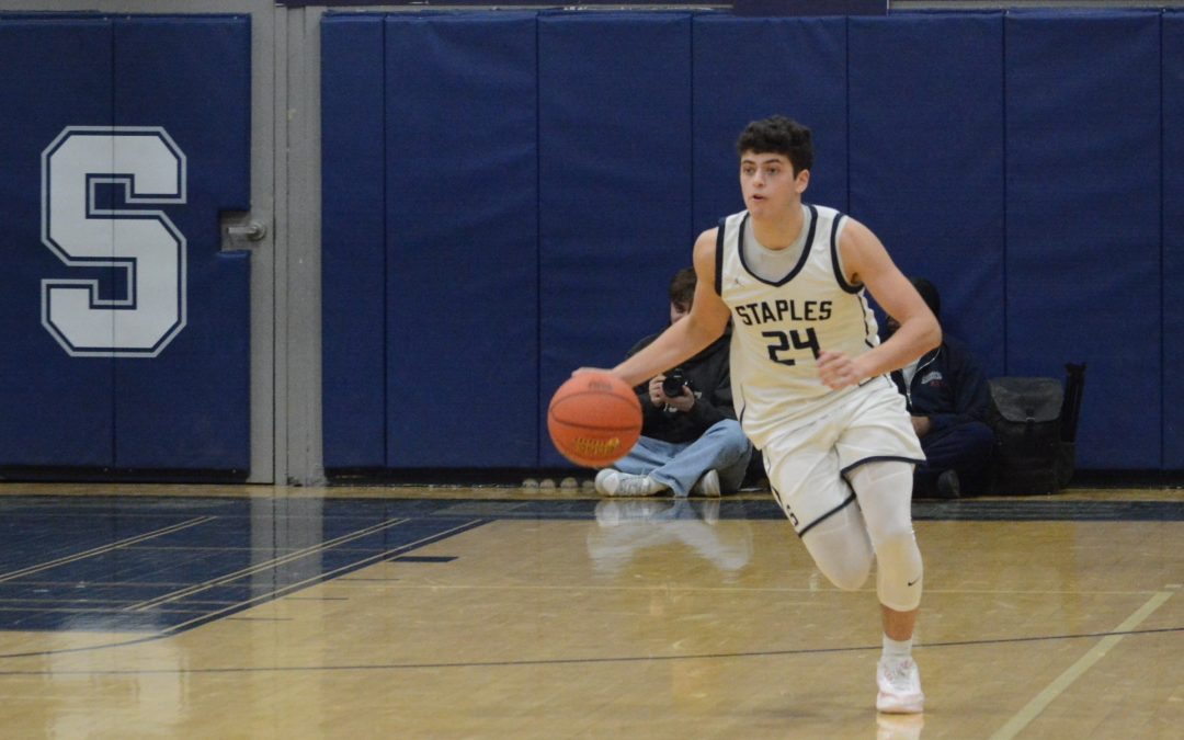Boys basketball team pulls away, improves to 18-0