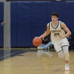 Boys basketball team pulls away, improves to 18-0