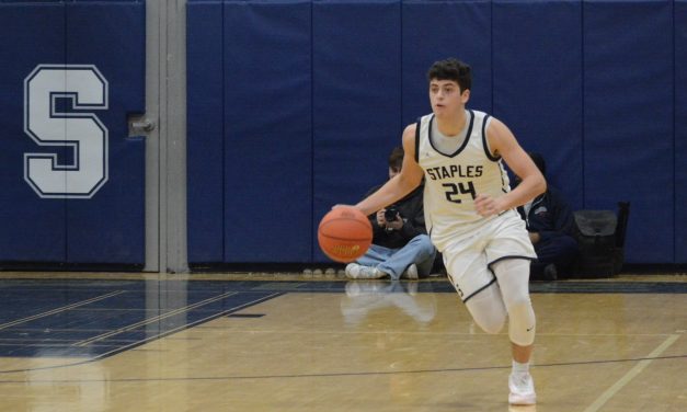 Boys basketball team pulls away, improves to 18-0