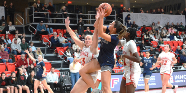 Harvey leads Wreckers over Warde in state quarterfinals