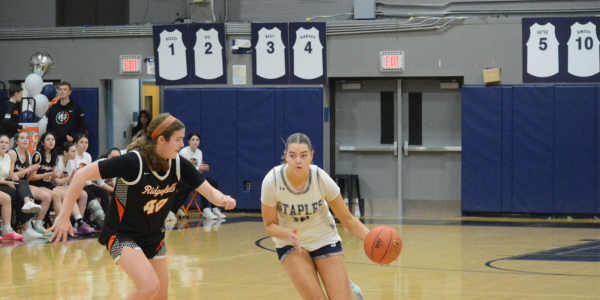 Chloe Smith races up the court in FCIAC playoff action - Photo Andy Hutchison