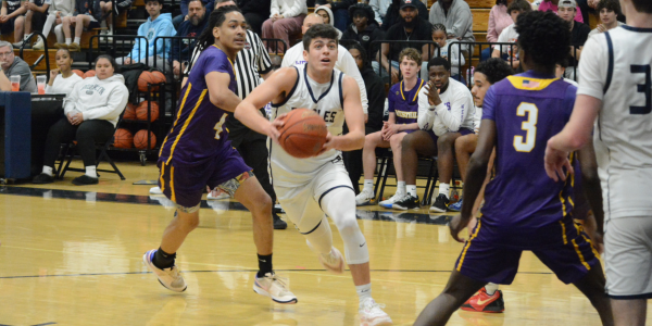 Staples boys march into March