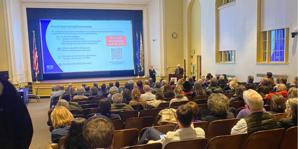 Werner Liepolt speaks from the lectern