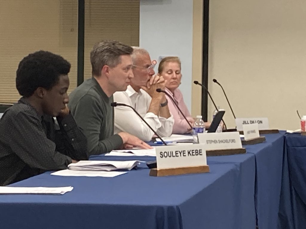 Members of the board including Souleye Kebe, Stephen Shackelford, Andy Frankel and Jill Dillon