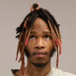Driver jumps curb and retaining wall, endangers workers, police say
