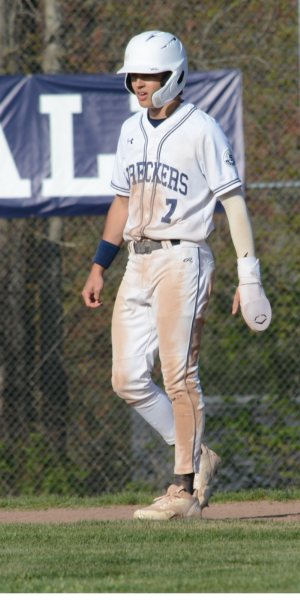 Jules Cicero, on the bases this spring, was all over the box score with four hits, six runs batted in and three runs scored in Stapes' state playoff opener - Photo Andy Hutchison