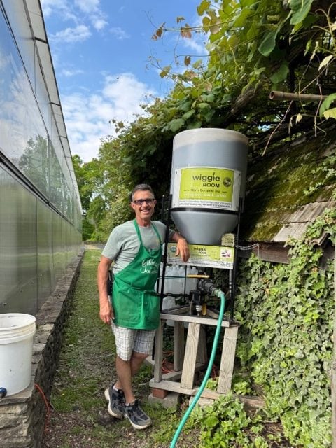 Joe Gloria, of Gilbertie’s Garden Center, helps to brew the compost tea that they sell on Fridays -Contributed photo