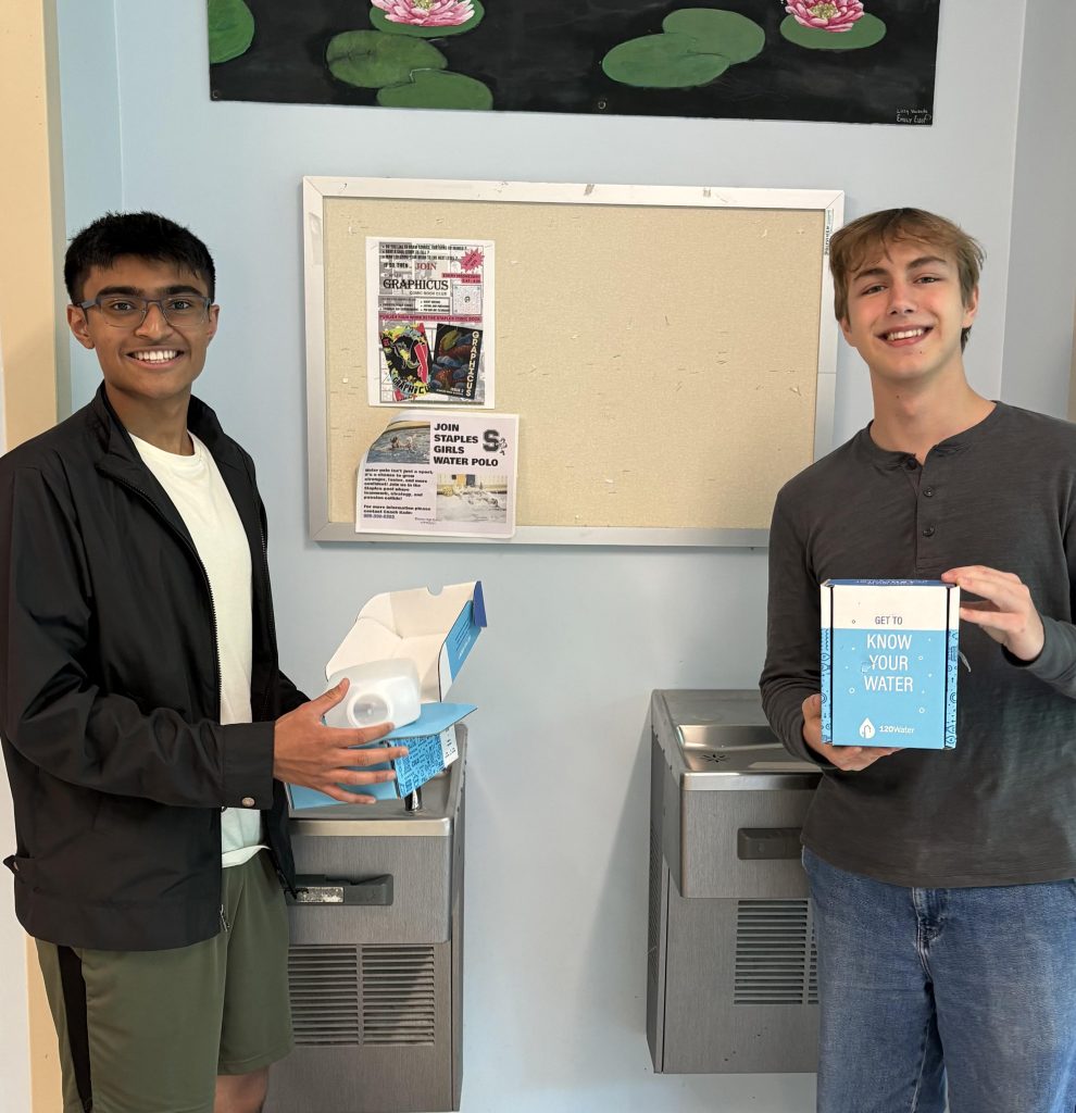 Sahil Vora on the left and Ignacy Nieweglowski holding lead testing kits - Contributed photo