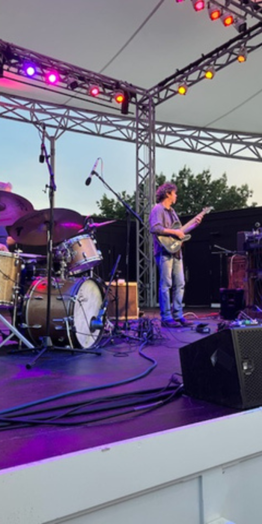 LaMP's Scott Metzger, the M in LaMP, on guitar at the The Levitt, July 24, 2026 - Photo Zana Tarsi