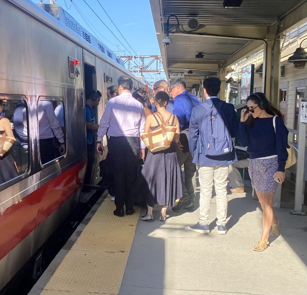 NYC-bound commuters at the Saugatuck Metro North station - Photo Ken Valenti