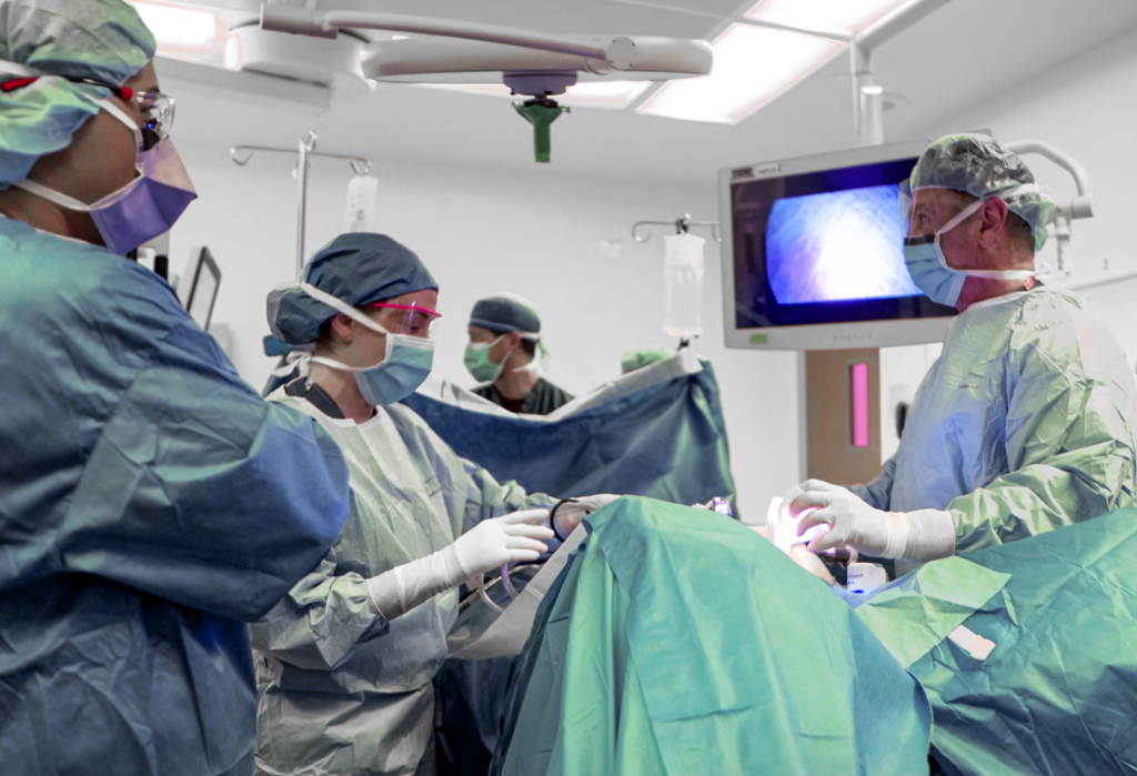 (Left to right) David Doo, MD, Leslie Andriani, MD and Philip Corvo, MD performing an opportunistic salpingectomy and pelvic surgery together at Norwalk Hospital - Photo Northwell Health
