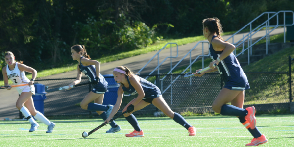 Ava Pattinson, flanked by Daisy Hackett (foreground) and Lila Manning - Photo Andy Hutchison