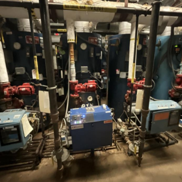 Evaluation of building HVAC system and indoor air handling unit at Greens Farm El - Photo Colliers