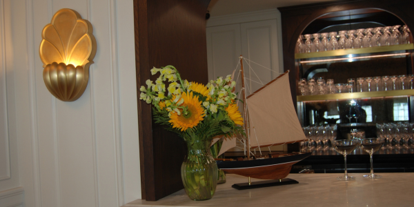A fall bouquet freshens the dining room's bar - Photo Westport Journal